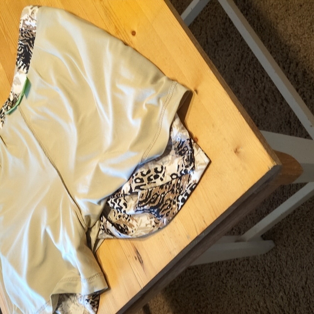 Elevate Your Golf Game with the Allyson Whitmore Animal Print Skort - Picture 10 of 11